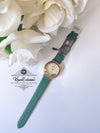 FEMALE GREEN STRAP WATCH